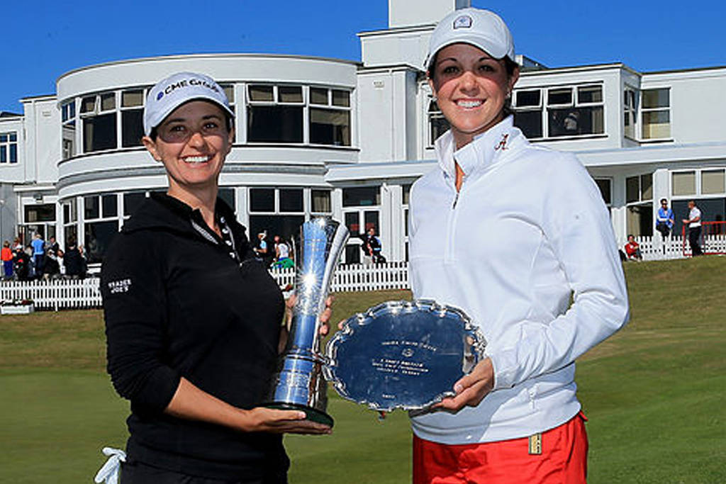 Mo Martin (left) and Emma Talley pose with their trophies after the 2014 British Women's Open